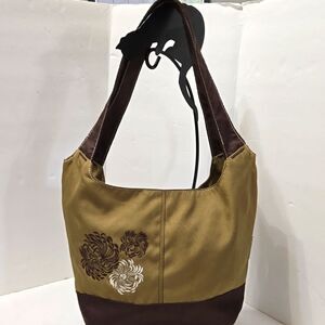 Columbia Green and brown purse with flower graphic Zipper Closure And Two Pocket